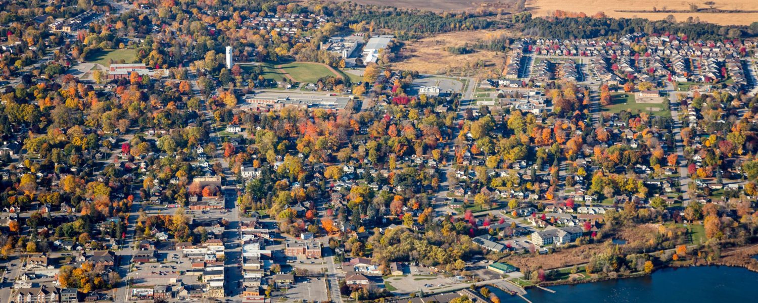 An aerial view of downtown Port Perry, a small town in Ontario, Canada. A view from the east showing waterfront on Lake Scugog. An aerial view of downtown Port Perry, a small Town on Lake Scugog, north of Durham Region.